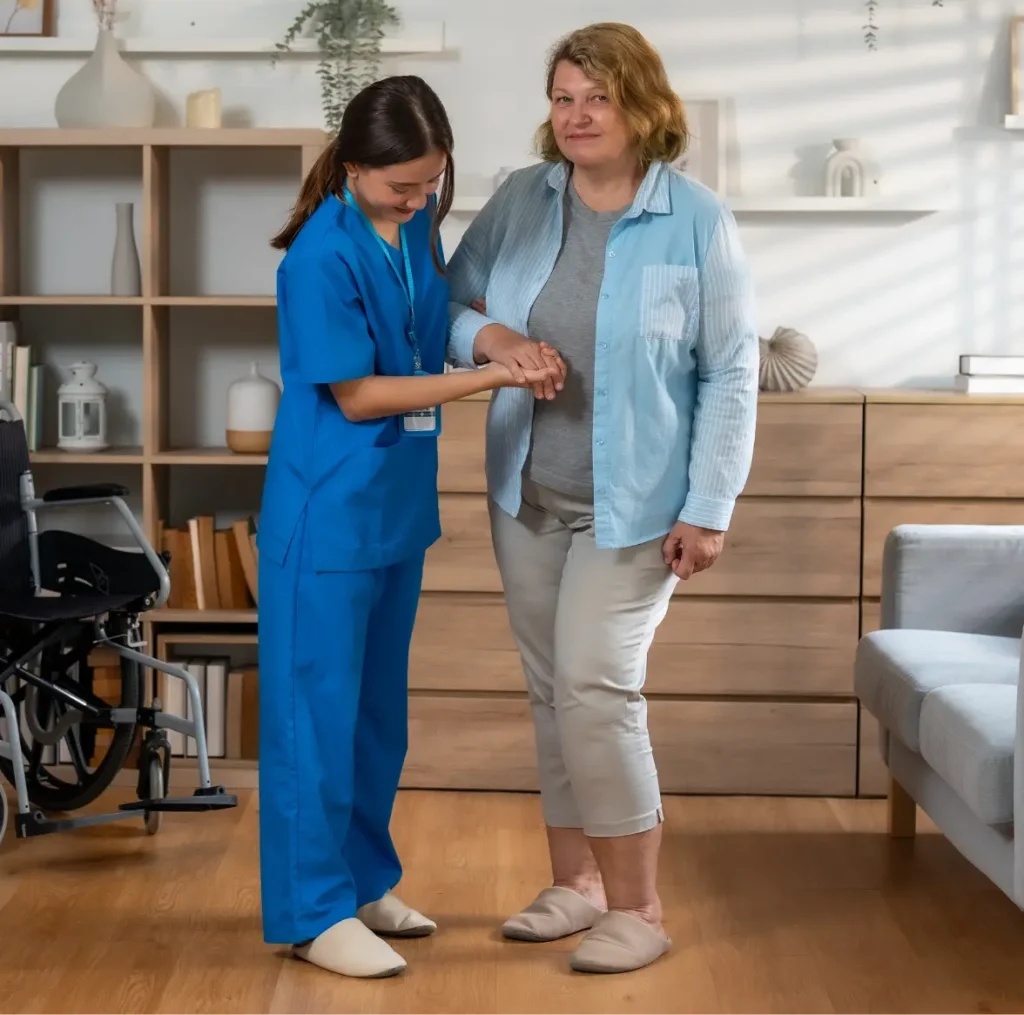 disabled women walking with support of disability support nurse