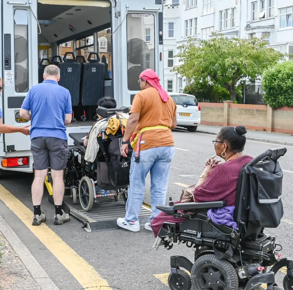 disabled person on wheelchair getting on a van