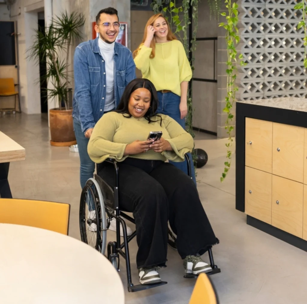 disabled women on wheelchair with friends